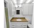 Clean bathroom with a white vanity, updated fixtures, and shower-tub, providing a functional design at 5425 Lewellyn Rd, Lakeland, FL 33810