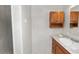Updated bathroom featuring marble tile, shower, and granite vanity at 5425 Lewellyn Rd, Lakeland, FL 33810