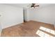 Spacious living room with hardwood floors and a ceiling fan at 5425 Lewellyn Rd, Lakeland, FL 33810