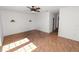 Cozy living room with hardwood floors and a ceiling fan at 5425 Lewellyn Rd, Lakeland, FL 33810