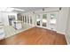 Spacious living room with hardwood floors and views of the kitchen and patio at 5425 Lewellyn Rd, Lakeland, FL 33810