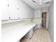 Bright office space features built-in desks and cabinetry for ample storage and organization at 5425 Lewellyn Rd, Lakeland, FL 33810