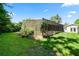 Spacious screened enclosure overlooks the lush green backyard at 5425 Lewellyn Rd, Lakeland, FL 33810