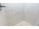 Modern shower with white marble tile walls and floors at 5425 Lewellyn Rd, Lakeland, FL 33810