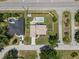 Bird's-eye view of the property with a pool, set in a neighborhood close to roadways at 5519 Club W Hl, Lakeland, FL 33812