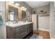 Bright bathroom featuring a double sink vanity with ample storage space at 5519 Club W Hl, Lakeland, FL 33812