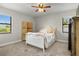 Bright bedroom with natural light, ceiling fan, and decorative screen at 5519 Club W Hl, Lakeland, FL 33812