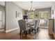 Stylish dining room featuring a rustic table, elegant seating, and tasteful decor at 5519 Club W Hl, Lakeland, FL 33812