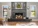 Detailed close-up of a dark stone fireplace with decorative accents and built-in lighting at 5519 Club W Hl, Lakeland, FL 33812
