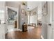 The view of a tidy foyer, seamlessly transitioning to other areas of the home, like dining room and laundry room at 5519 Club W Hl, Lakeland, FL 33812