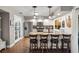 Bright kitchen featuring granite countertops, stainless steel appliances and a cozy breakfast bar with seating at 5519 Club W Hl, Lakeland, FL 33812