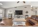 A spacious living room with modern decor, vaulted ceilings, and hardwood floors at 5519 Club W Hl, Lakeland, FL 33812