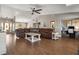 Spacious living room with hardwood floors, leather sectional and vaulted ceilings at 5519 Club W Hl, Lakeland, FL 33812