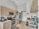 Bright kitchen featuring stainless steel appliances and ample cabinet space at 555 Heather Glen Dr, Winter Haven, FL 33884
