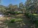 Aerial view of the property highlighting the spacious backyard and mature tree coverage at 5624 Laurel Oak Dr, Lakeland, FL 33811