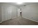 Bedroom featuring neutral wall paint, carpet floors, and a closet at 5624 Laurel Oak Dr, Lakeland, FL 33811