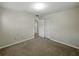 Comfortable bedroom featuring neutral paint, carpet floors and a closet at 5624 Laurel Oak Dr, Lakeland, FL 33811