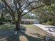 Lovely front lawn and tree-lined single-Gathering home at 5624 Laurel Oak Dr, Lakeland, FL 33811
