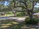 Beautiful homesite surrounded by lush landscaping and mature trees at 5624 Laurel Oak Dr, Lakeland, FL 33811