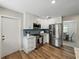 Kitchen showcases stainless steel refrigerator, range, microwave and ample cabinet space at 5624 Laurel Oak Dr, Lakeland, FL 33811