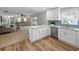 Open-concept kitchen featuring stainless steel appliances and a view of the living area at 5624 Laurel Oak Dr, Lakeland, FL 33811