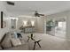 Bright and airy living room with sliding glass doors to the lanai at 5624 Laurel Oak Dr, Lakeland, FL 33811