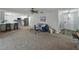 Open-concept living room and kitchen perfect for entertaining guests at 5624 Laurel Oak Dr, Lakeland, FL 33811