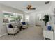Cozy living room features neutral tones, comfortable seating, and a bright window at 5624 Laurel Oak Dr, Lakeland, FL 33811