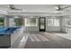 Sun room with a built-in spa, a ceiling fan, recessed lighting, and access to the yard at 5624 Laurel Oak Dr, Lakeland, FL 33811