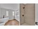 Beautiful bathroom with tub, separate tiled shower, modern fixtures, and double vanity at 5751 Cherry Tree Dr, Lakeland, FL 33811