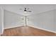 Spacious bedroom featuring wood-look vinyl floors, recessed lighting, and natural light at 5751 Cherry Tree Dr, Lakeland, FL 33811