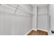 Walk-in closet with wood floor and white wire shelving for optimal storage at 5751 Cherry Tree Dr, Lakeland, FL 33811