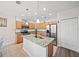 Modern kitchen featuring stainless steel appliances, granite countertops, and a center island  at 5793 Dornich Dr, Auburndale, FL 33823