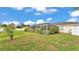 Spacious backyard with a screened pool enclosure, perfect for outdoor enjoyment at 601 Pintail Cir, Auburndale, FL 33823