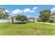 A well-kept lawn and beautiful landscaping enhance this home's curb appeal at 601 Pintail Cir, Auburndale, FL 33823