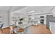 Open eat-in kitchen with breakfast bar and modern appliances at 601 Pintail Cir, Auburndale, FL 33823