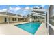 Screened-in pool with a patio perfect for relaxation and entertaining at 601 Pintail Cir, Auburndale, FL 33823