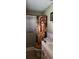 Bathroom featuring glass shower, vanity sink, and decorative shower curtain at 629 W Williams St, Lakeland, FL 33805