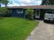 Modest single story home showcasing well-manicured green lawn at 629 W Williams St, Lakeland, FL 33805