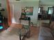 Partially furnished living room with hardwood floors and decor at 629 W Williams St, Lakeland, FL 33805
