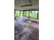 Enclosed patio with a view of the outdoor yard and a cat tree at 629 W Williams St, Lakeland, FL 33805