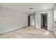 Clean bedroom features neutral walls, tile flooring, and two doorways at 633 Glenda St, Lakeland, FL 33805