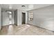 Simple bedroom features neutral walls, tile flooring, closet, and window AC unit at 633 Glenda St, Lakeland, FL 33805