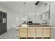Kitchen offers stylish floors and a breakfast bar at 633 Glenda St, Lakeland, FL 33805