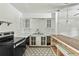 The kitchen features updated floors and white cabinets at 633 Glenda St, Lakeland, FL 33805