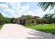 Beautiful single-Gathering home boasting a large driveway and well-maintained landscaping at 6357 Ashley Dr, Lakeland, FL 33813