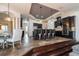 The spacious kitchen with an island bar, granite counters, and luxury pendant lighting at 6357 Ashley Dr, Lakeland, FL 33813