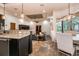 Open-concept living area seamlessly connects the kitchen, dining, and living spaces at 6357 Ashley Dr, Lakeland, FL 33813