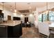 Open-concept living area seamlessly connects the kitchen, dining, and living spaces at 6357 Ashley Dr, Lakeland, FL 33813