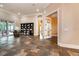 Open living room with tile flooring and access to the patio at 6357 Ashley Dr, Lakeland, FL 33813